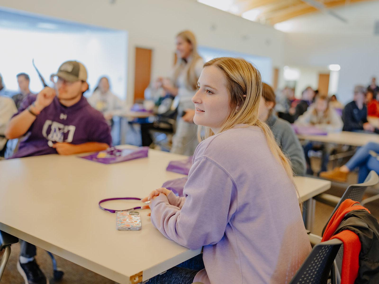 a group of people in a classroom