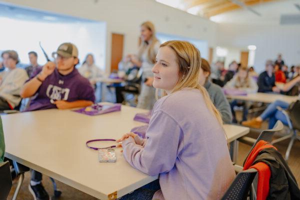 a group of people in a classroom